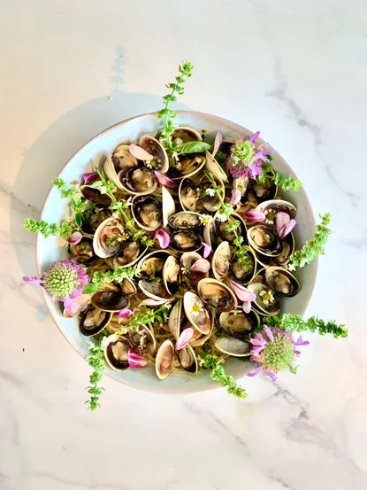 Photograph from Recipe: Clams with Bee Balm & Basil Blossom Pesto