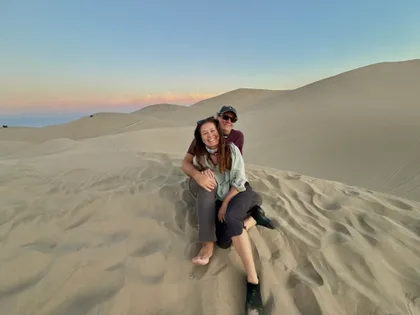 Sitting out on the sand at dusk
