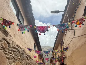 Bunting over a cobbled street in Ollantaytambo
